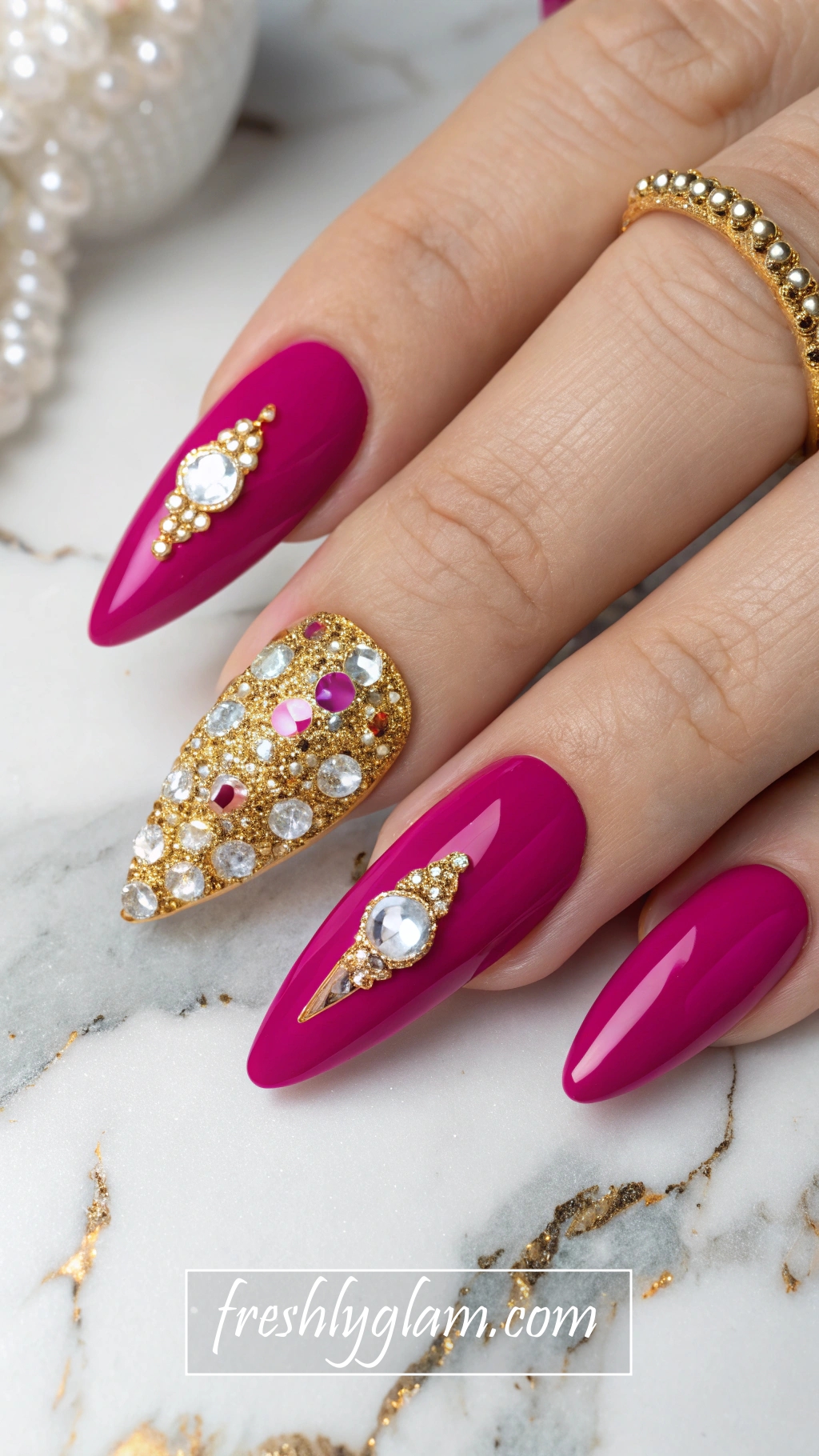 021 Bold Fuchsia Stiletto Nails with Gold ACY Rhinestones for a Luxe Glam Look