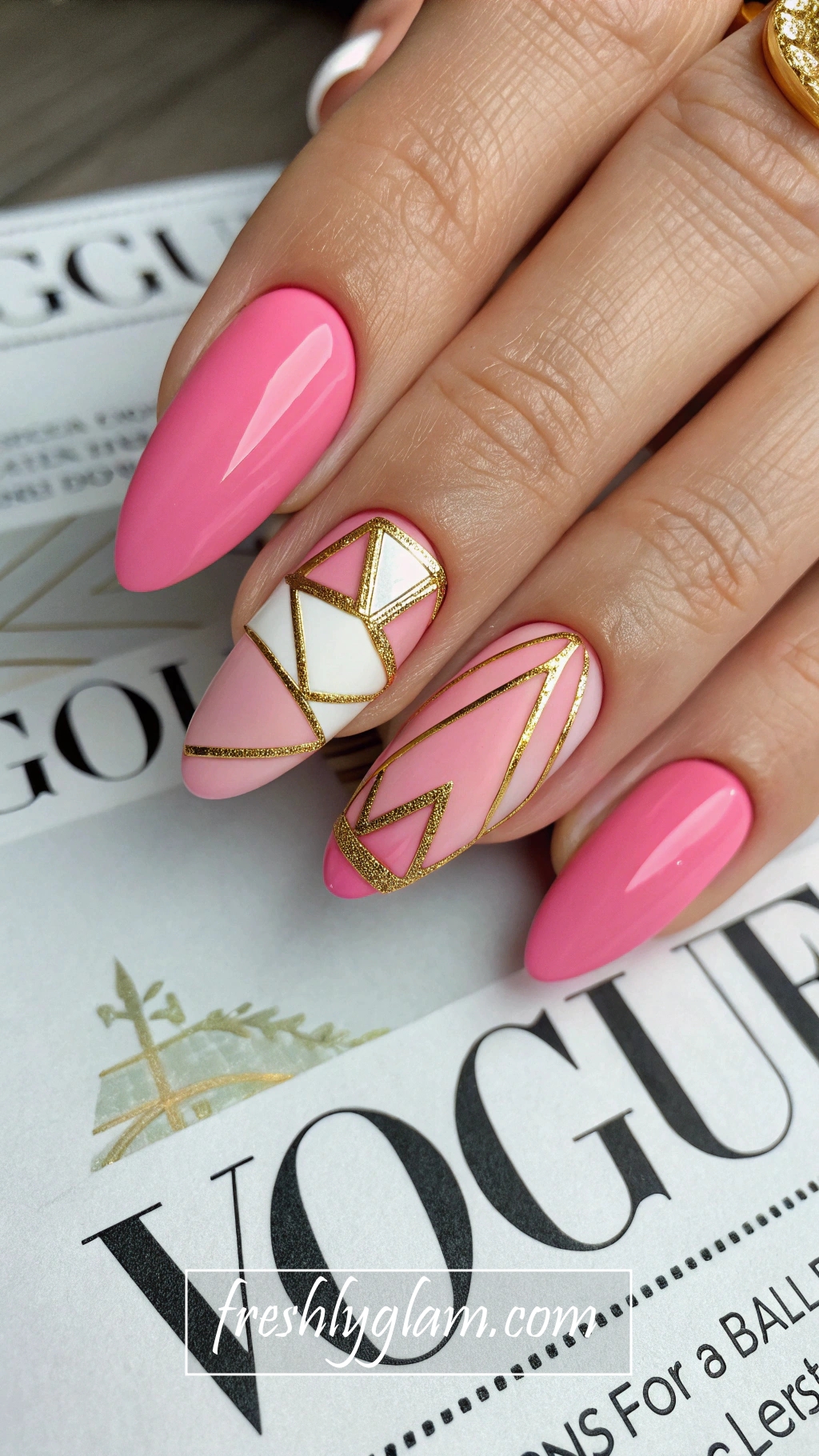 023 Hot Pink and Gold Almond Nails with CoutureAC0 Inspired Nail Art