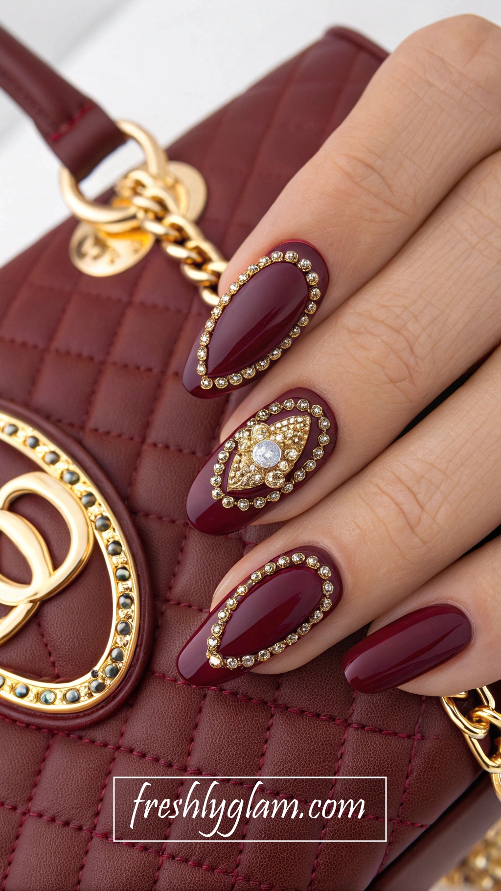 037 Classy Burgundy Nails with Gold Details for a Fashionista Statement