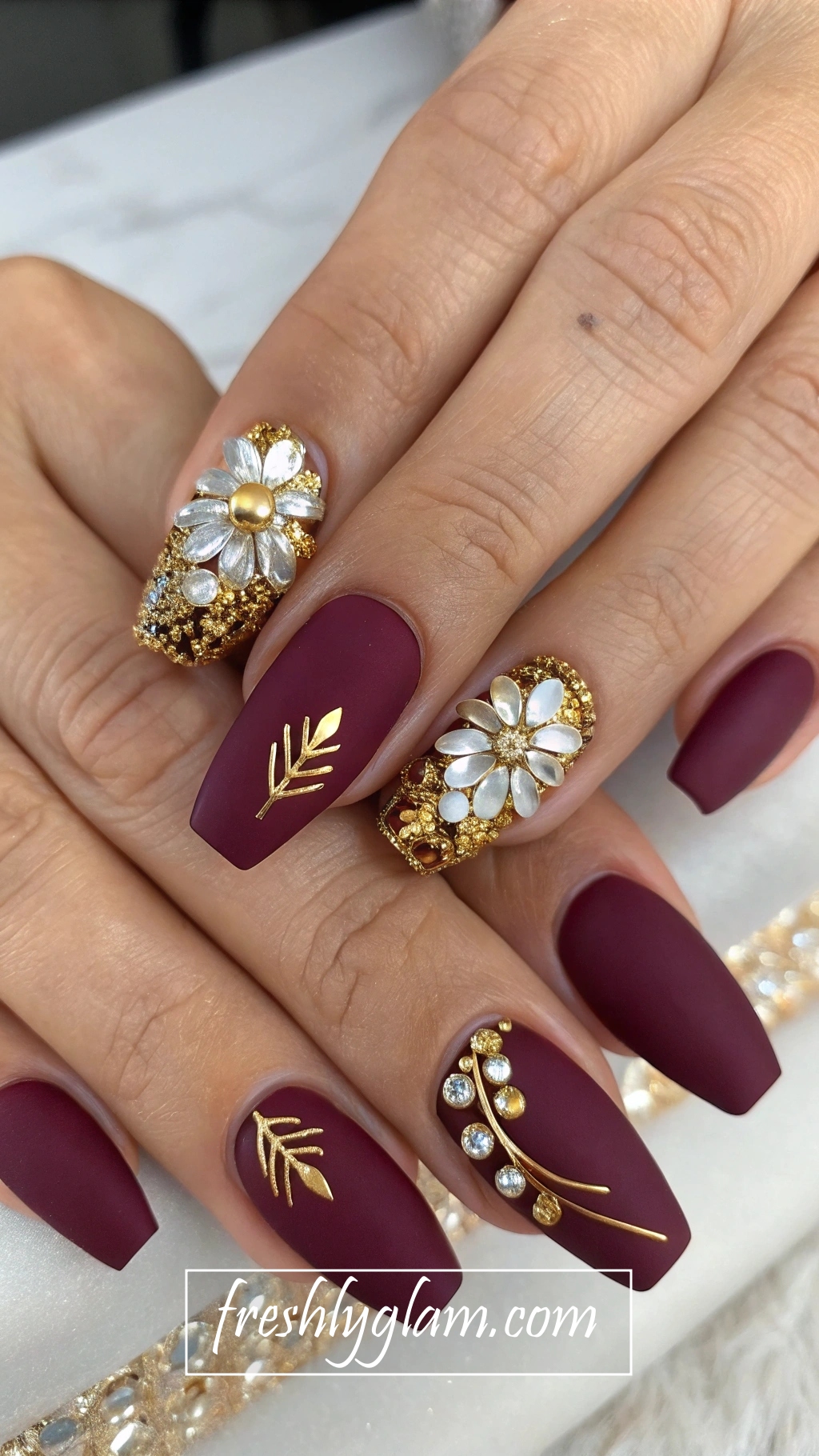 085 Matte Plum Ballerina Nails with Gold Foil and Rhinestones for the Edgy Runway Queen